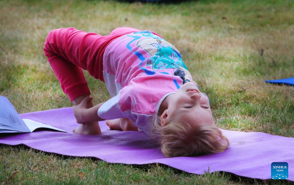 People mark upcoming International Yoga Day in Belarus