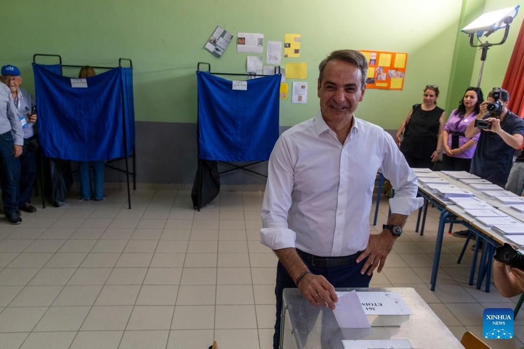 Greece's conservatives win election, pledge more reforms