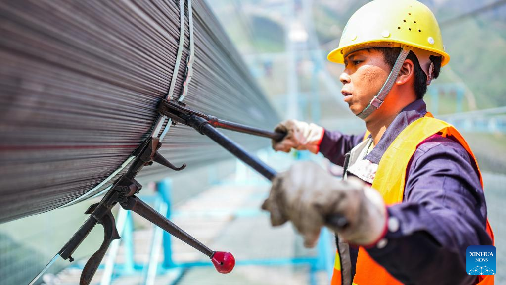 Zangke River grand bridge under construction in SW China