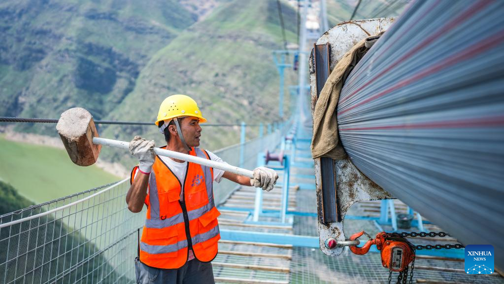 Zangke River grand bridge under construction in SW China