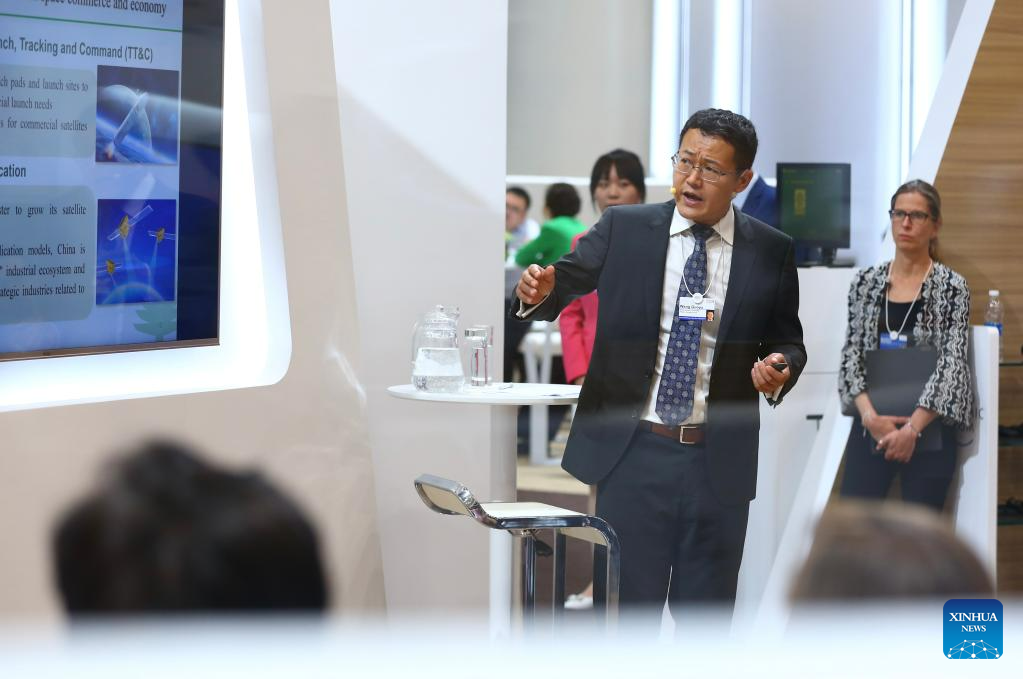 Participants attend sessions at Summer Davos in Tianjin