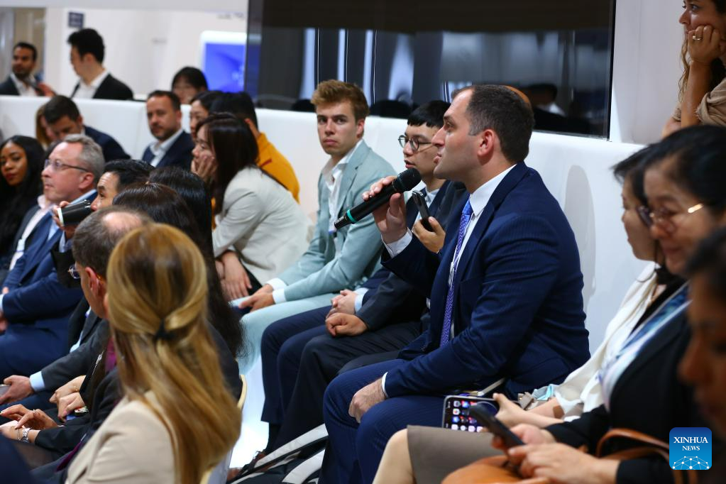 Participants attend sessions at Summer Davos in Tianjin