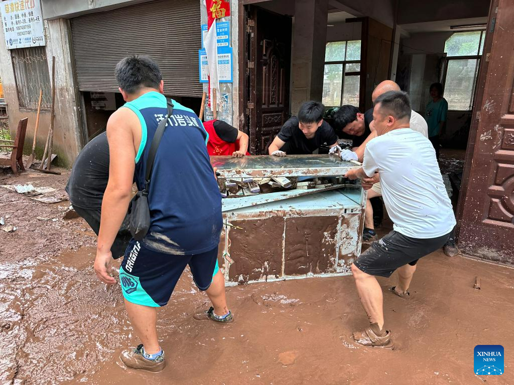 Nearly 7,000 evacuated after heavy rain in central China