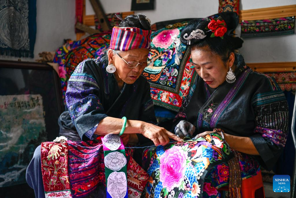 Across China: Miao embroiderer takes ethnic intangible heritage to world stage
