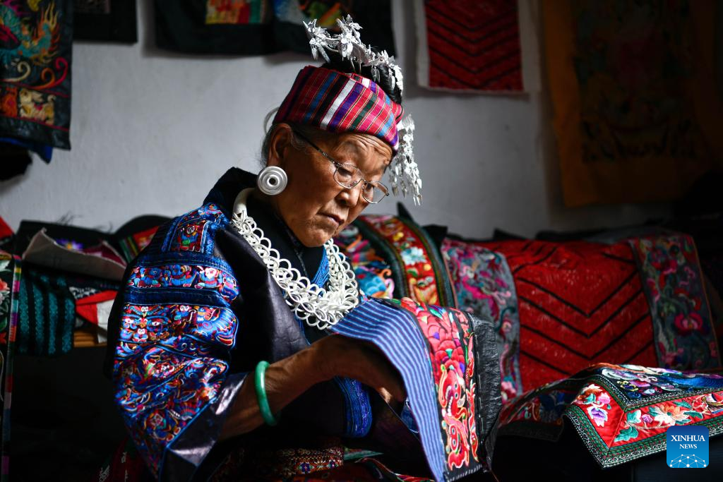 Across China: Miao embroiderer takes ethnic intangible heritage to world stage