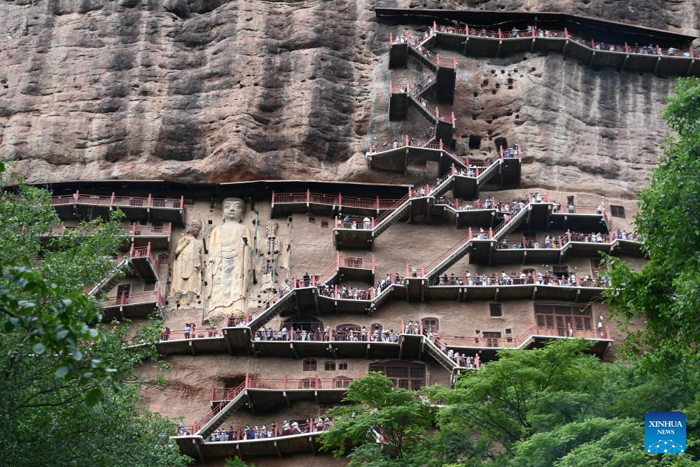 People visit Maijishan Grottoes in Tianshui City, NW China
