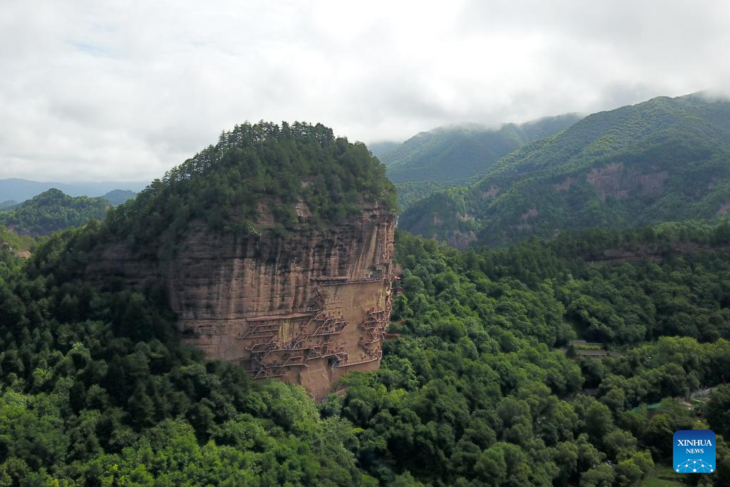 People visit Maijishan Grottoes in Tianshui City, NW China