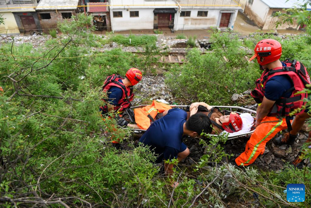 Rescue underway in flood-hit districts of Beijing