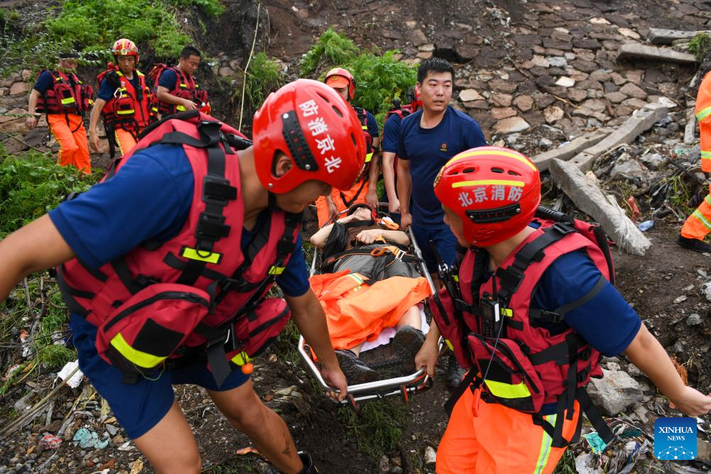 Rescue underway in flood-hit districts of Beijing