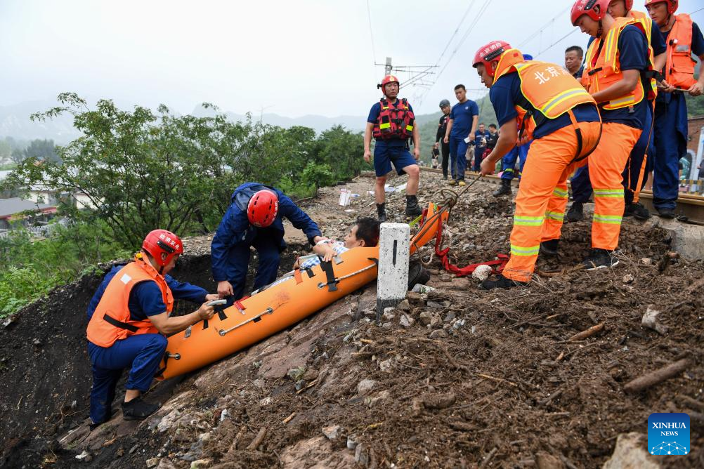 Rescue underway in flood-hit districts of Beijing