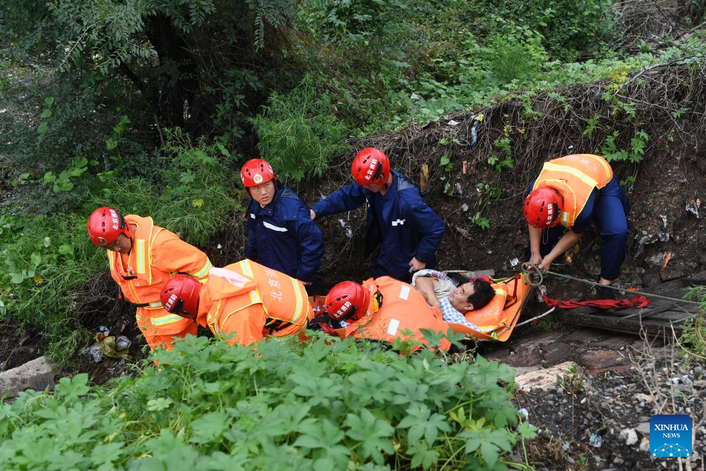 Rescue underway in flood-hit districts of Beijing