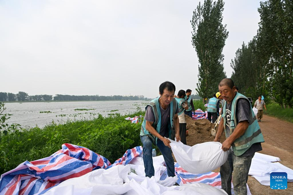 Heightening, reinforcement work of dams underway in Tianjin