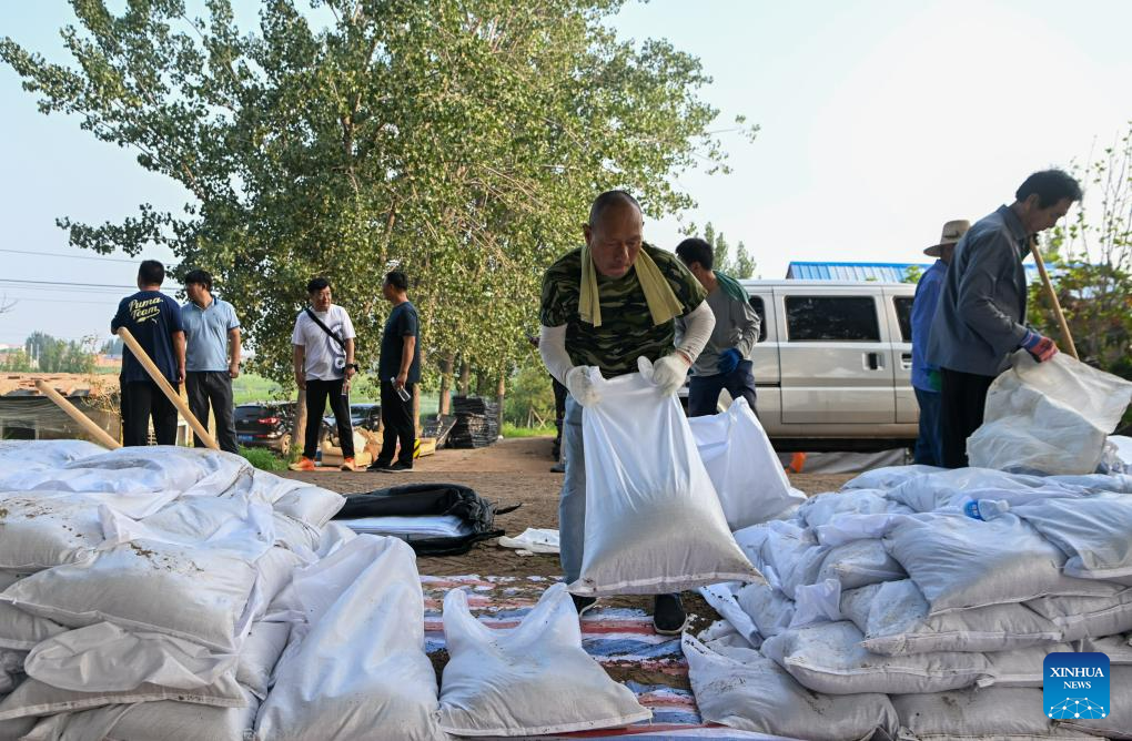 Heightening, reinforcement work of dams underway in Tianjin