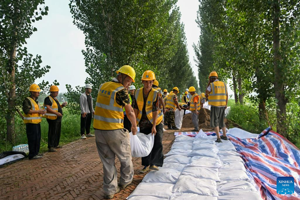 Heightening, reinforcement work of dams underway in Tianjin