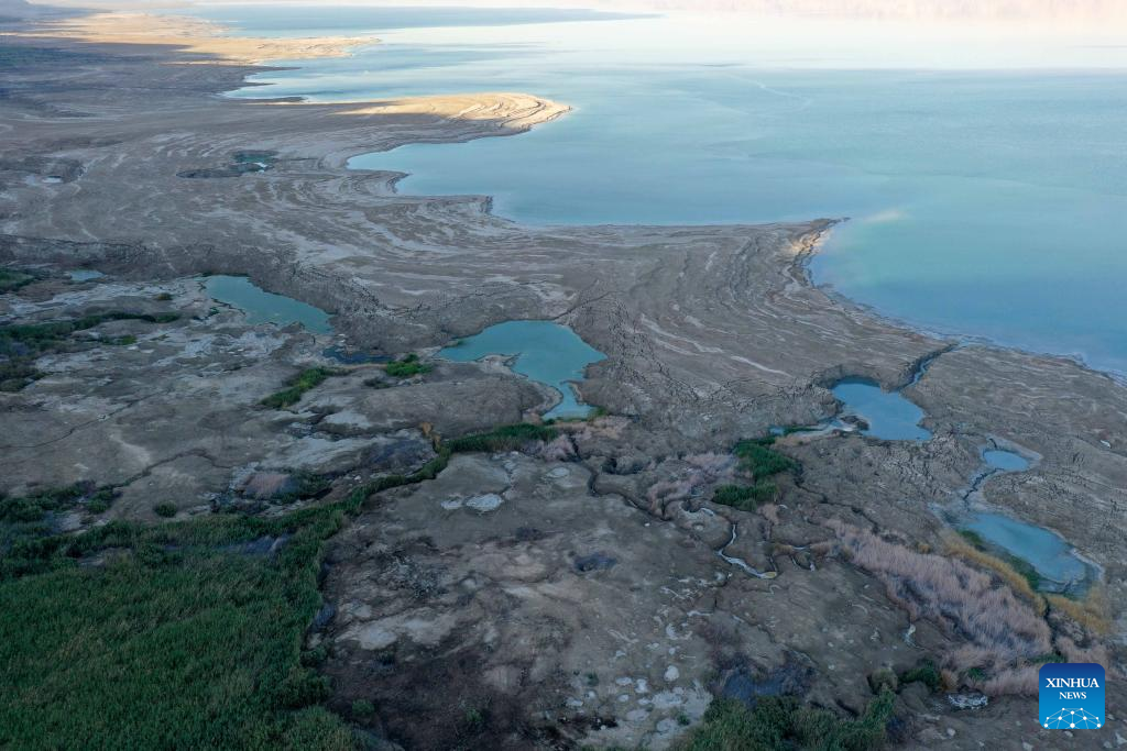 Sinkholes seen on shore of Dead Sea as water level drops