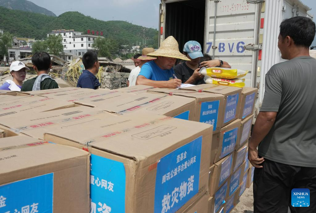 Relief supplies delivered to flood-affected residents in Laishui, N China