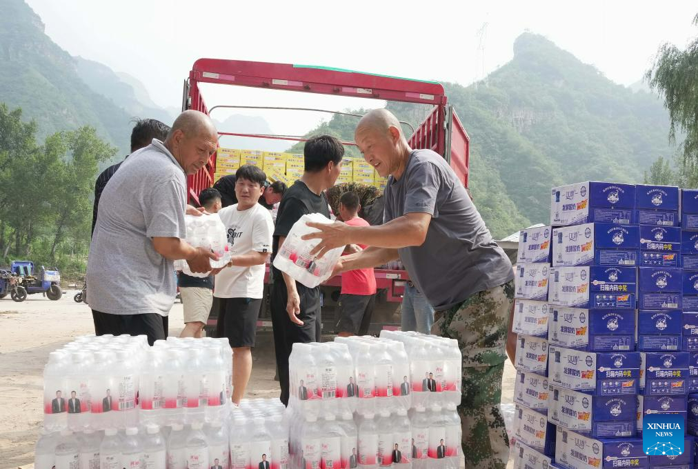 Relief supplies delivered to flood-affected residents in Laishui, N China