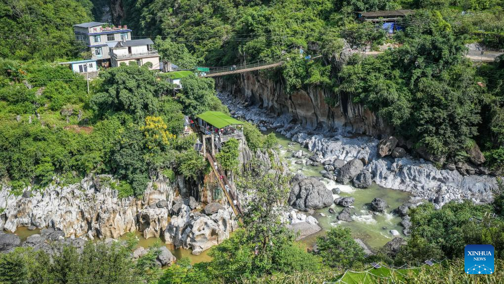 Pic story: farmer runs rural inn near world's highest bridge in SW China's Guizhou
