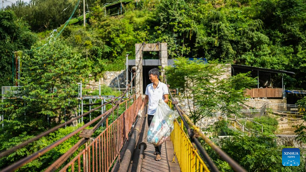 Pic story: farmer runs rural inn near world's highest bridge in SW China's Guizhou