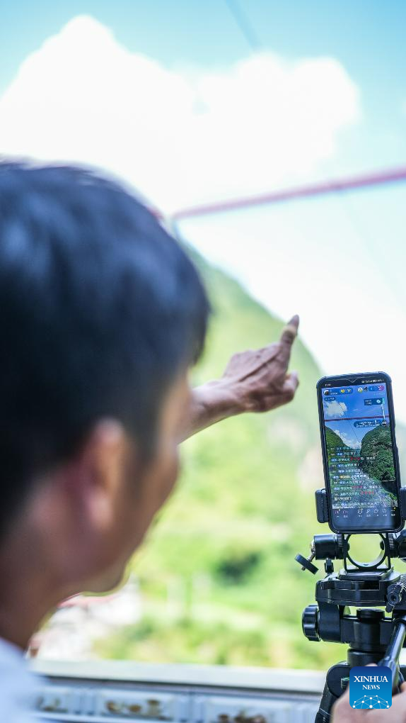Pic story: farmer runs rural inn near world's highest bridge in SW China's Guizhou
