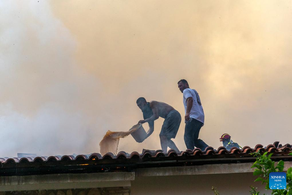Wildfires threaten Greece's UNESCO World Heritage monastery