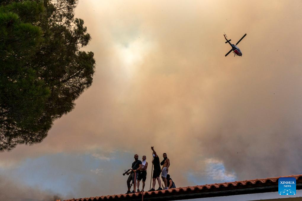Wildfires threaten Greece's UNESCO World Heritage monastery