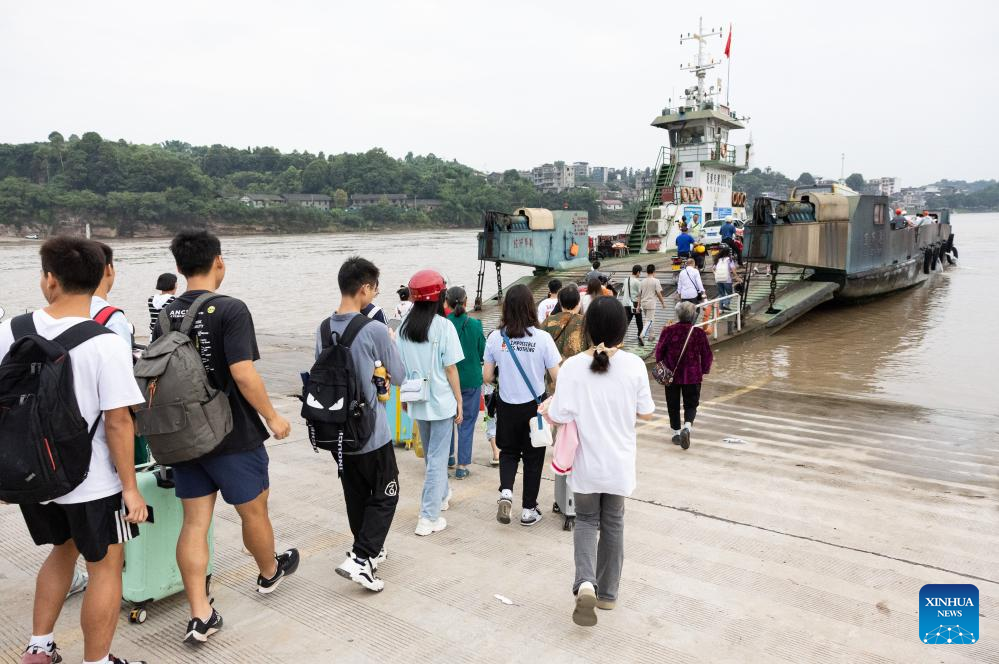 Ferry service ends as grand bridge opens to traffic in Yibin, SW China
