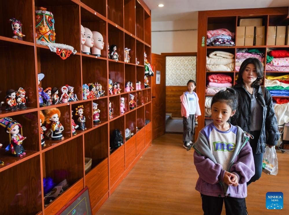 Handmade dolls bring fortunes to local residents in SW China's county