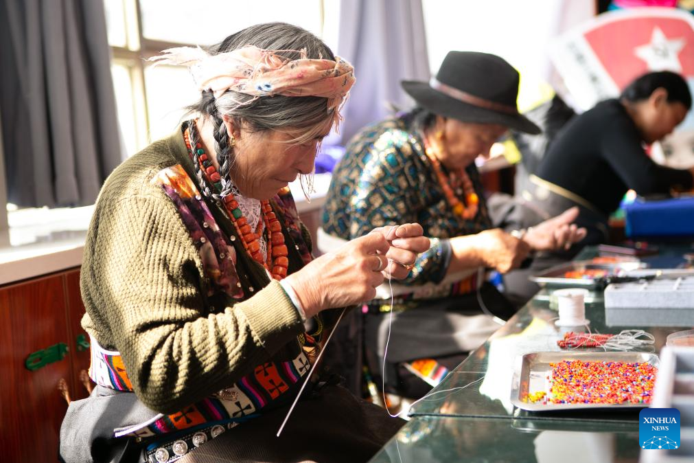 Handmade dolls bring fortunes to local residents in SW China's county