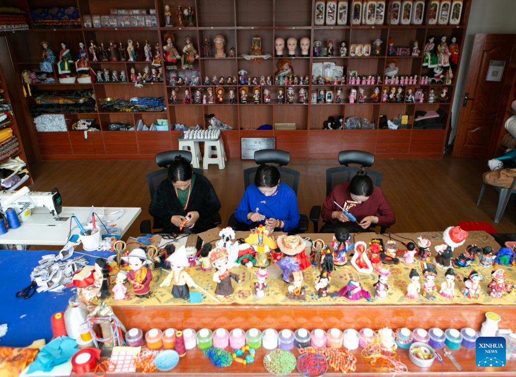 Handmade dolls bring fortunes to local residents in SW China's county