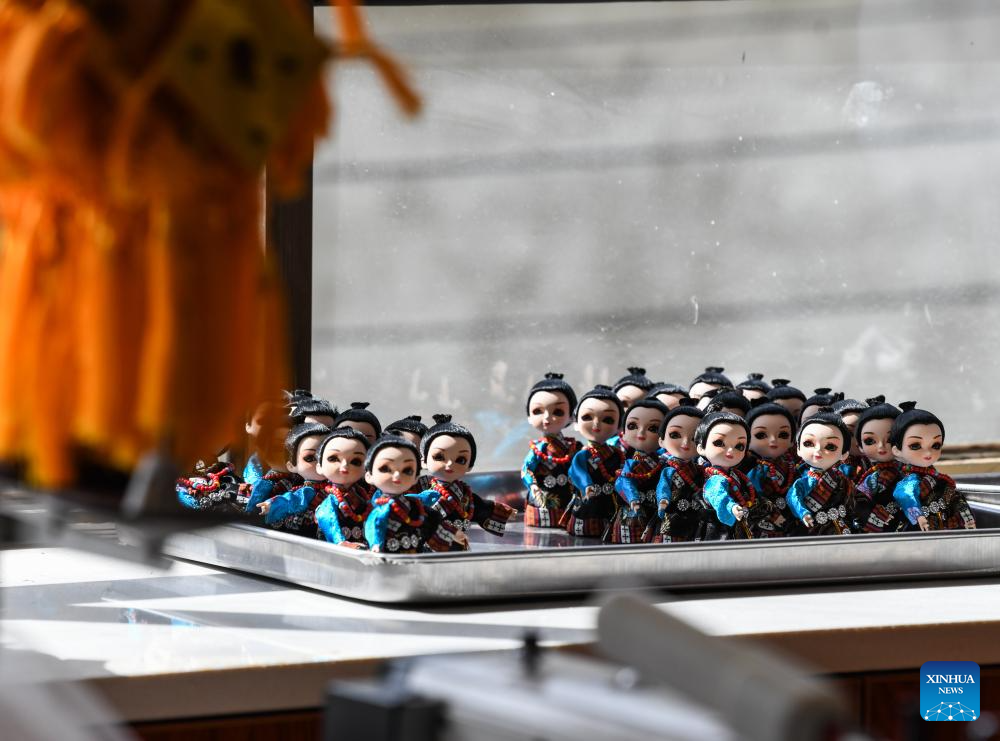 Handmade dolls bring fortunes to local residents in SW China's county