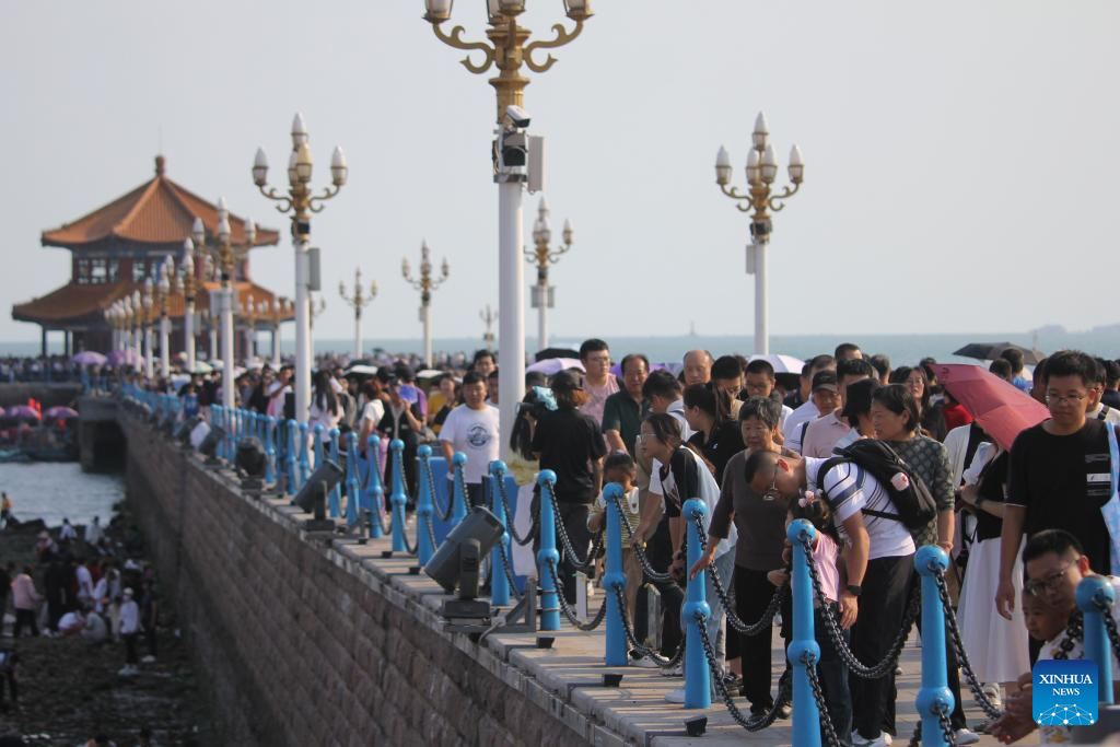 Tourism booms across China during Mid-Autumn Festival and National Day holiday