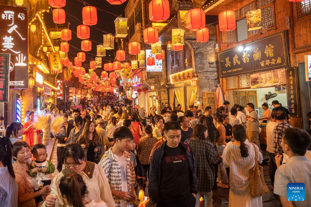 Tourism booms across China during Mid-Autumn Festival and National Day holiday