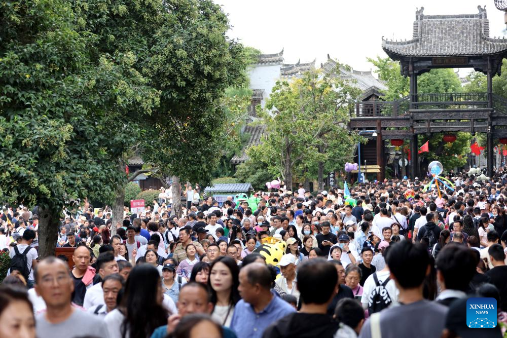 Tourism booms across China during Mid-Autumn Festival and National Day holiday