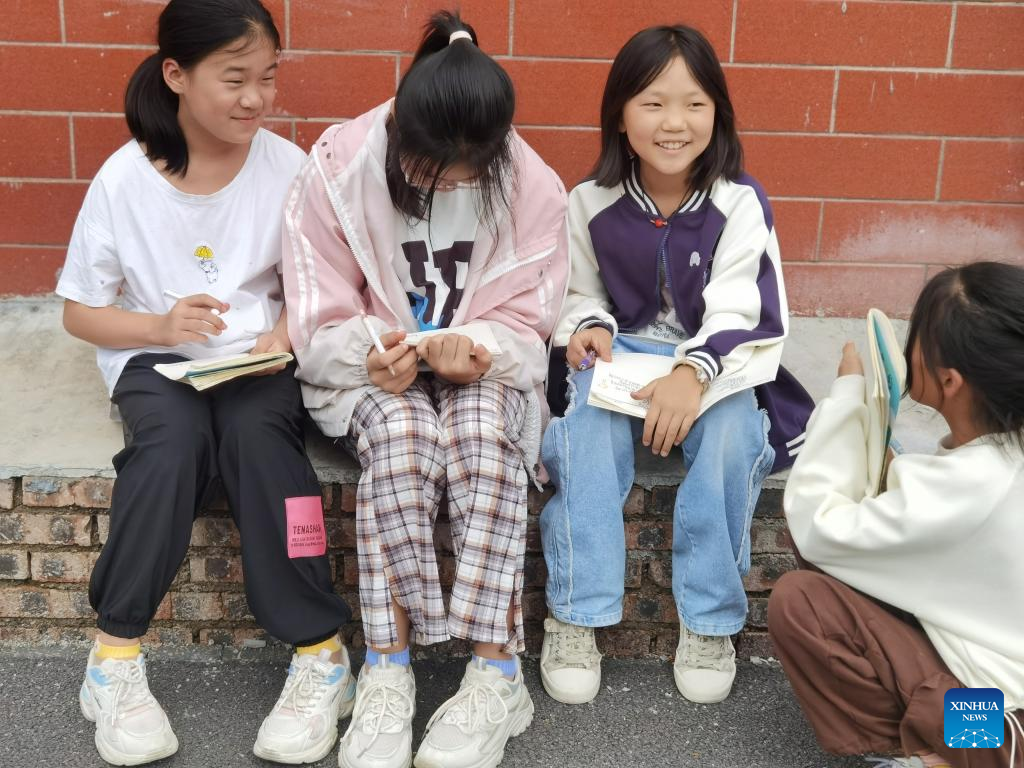 Feature: Chinese village children find their voices through verse