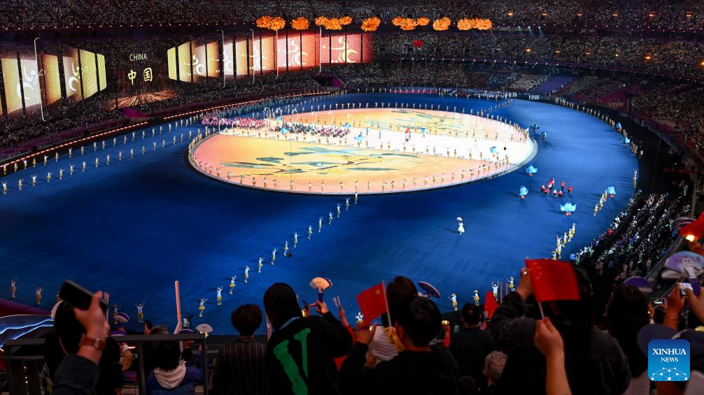 Delegations parade into stadium during opening ceremony of 4th Asian Para Games in Hangzhou