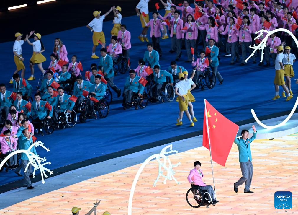 Delegations parade into stadium during opening ceremony of 4th Asian Para Games in Hangzhou