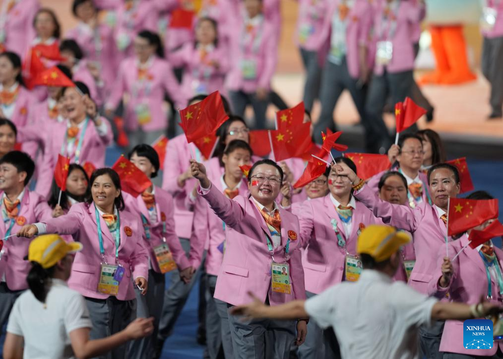Delegations parade into stadium during opening ceremony of 4th Asian Para Games in Hangzhou