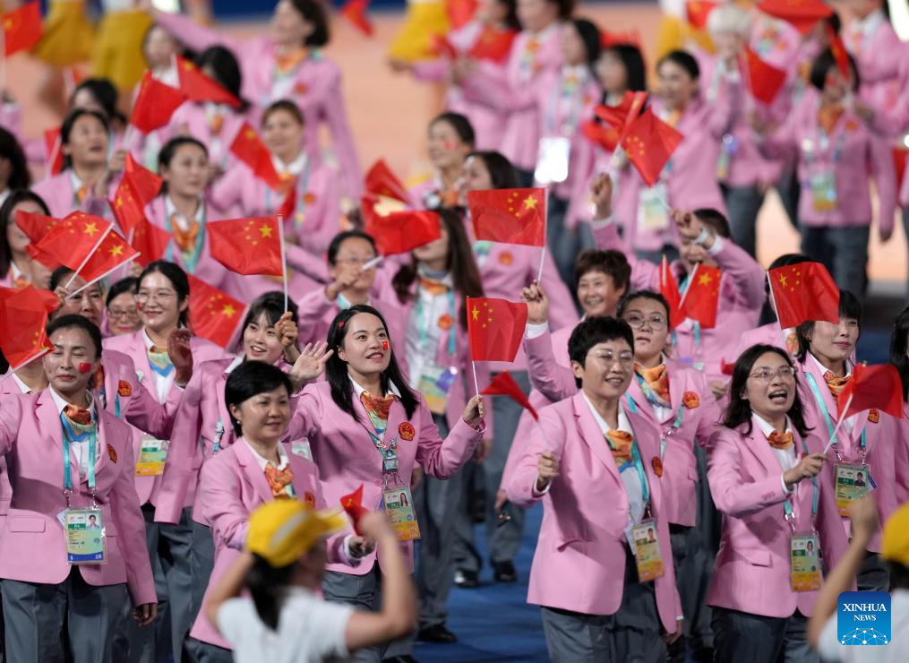 Delegations parade into stadium during opening ceremony of 4th Asian Para Games in Hangzhou