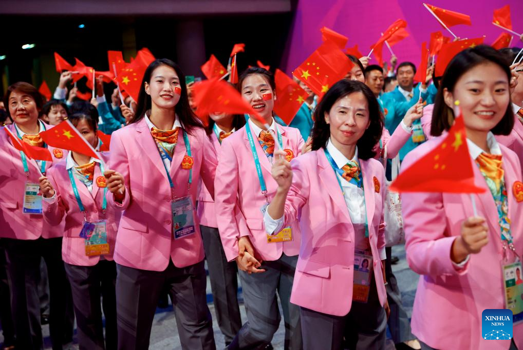 Delegations parade into stadium during opening ceremony of 4th Asian Para Games in Hangzhou