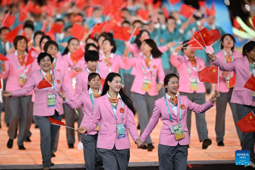 Delegations parade into stadium during opening ceremony of 4th Asian Para Games in Hangzhou