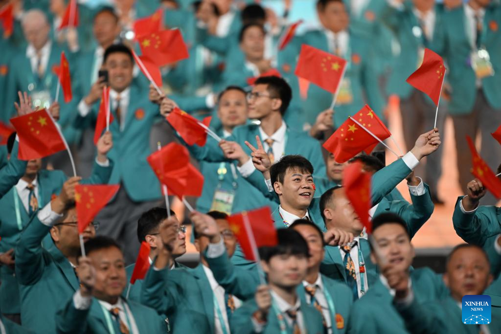Delegations parade into stadium during opening ceremony of 4th Asian Para Games in Hangzhou