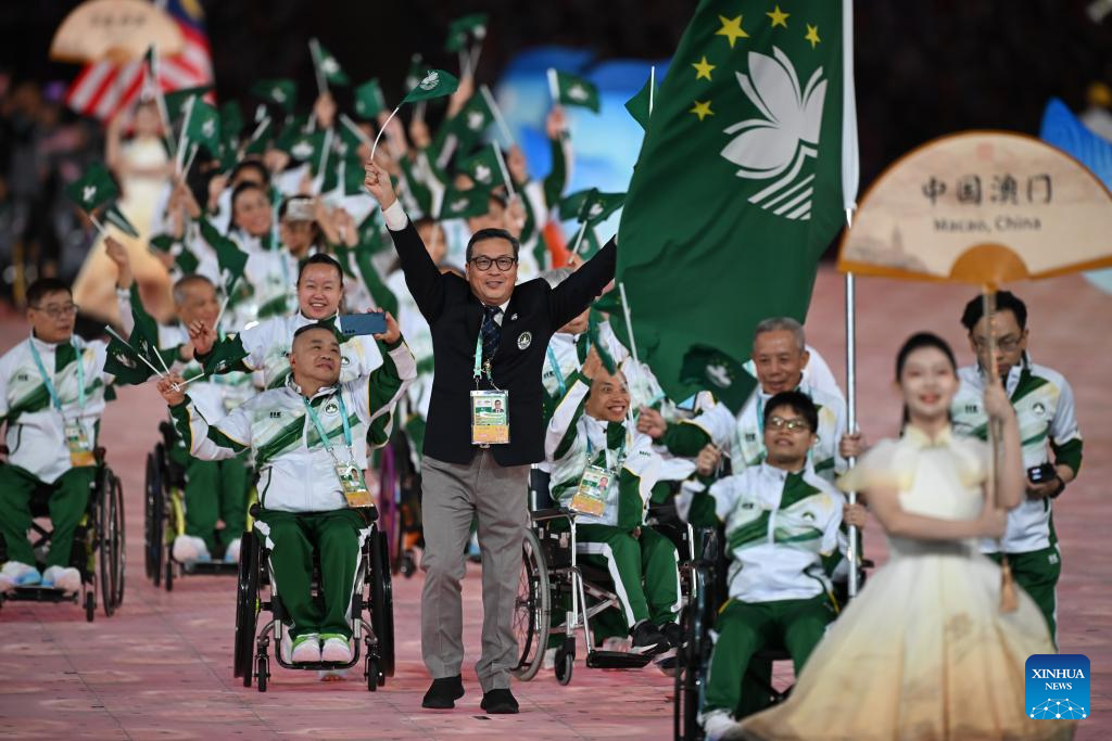 Delegations parade into stadium during opening ceremony of 4th Asian Para Games in Hangzhou