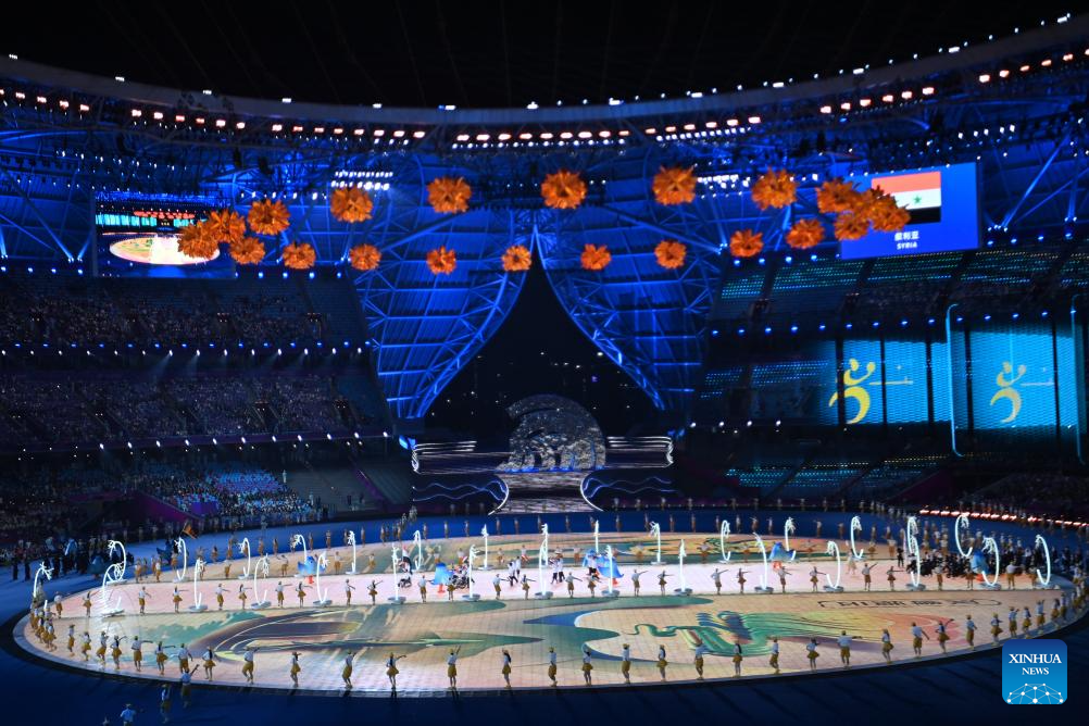 Delegations parade into stadium during opening ceremony of 4th Asian Para Games in Hangzhou