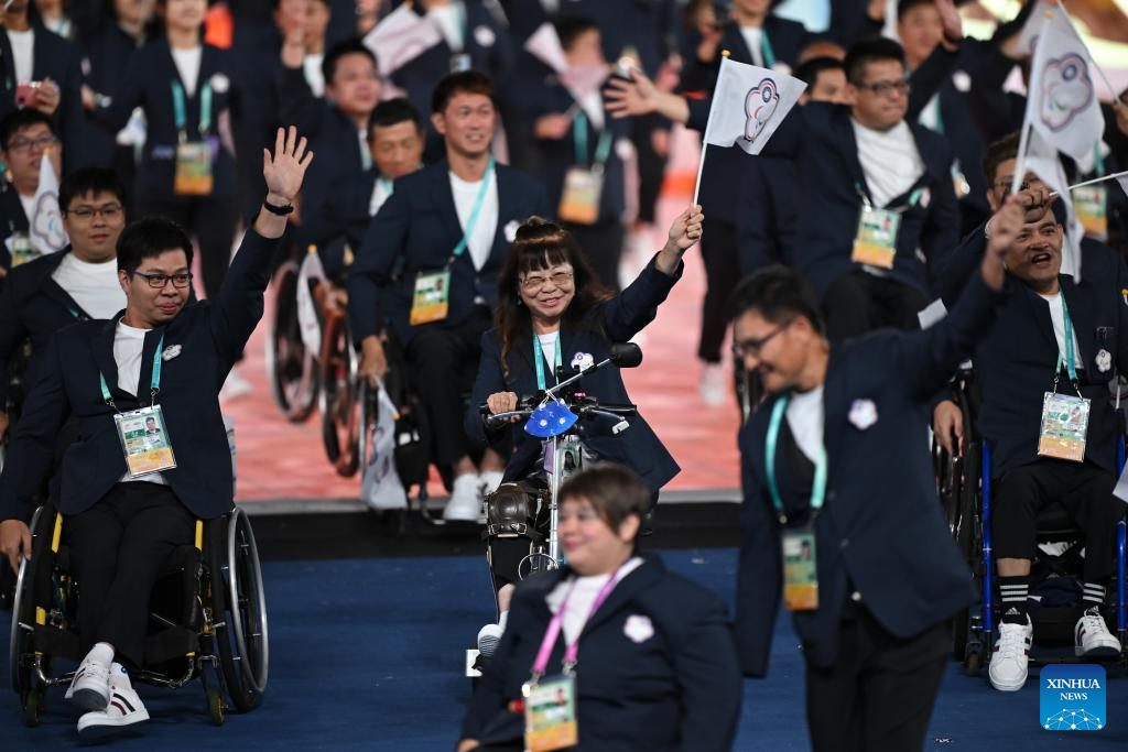 Delegations parade into stadium during opening ceremony of 4th Asian Para Games in Hangzhou