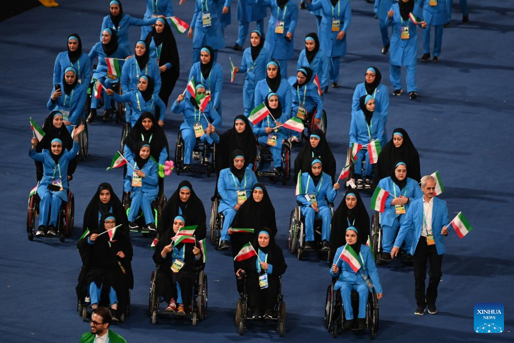 Delegations parade into stadium during opening ceremony of 4th Asian Para Games in Hangzhou