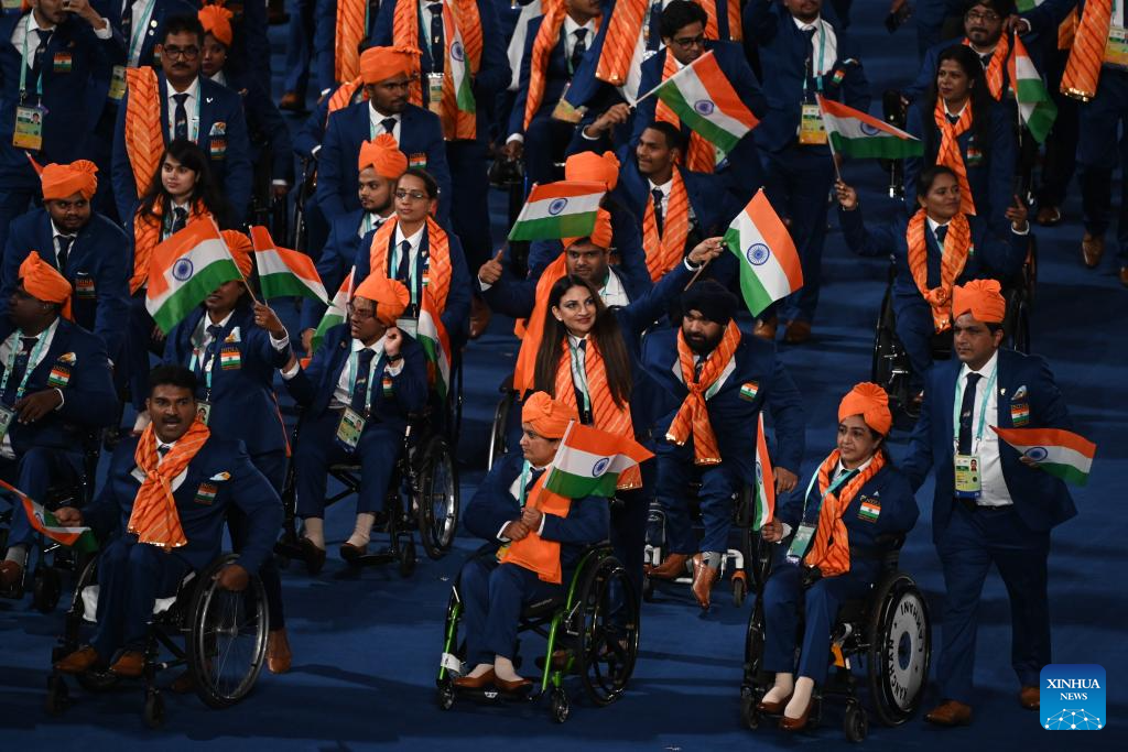 Delegations parade into stadium during opening ceremony of 4th Asian Para Games in Hangzhou