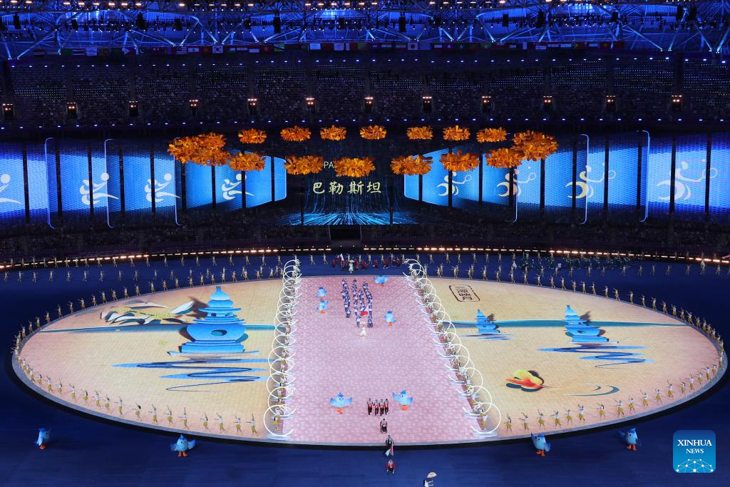 Delegations parade into stadium during opening ceremony of 4th Asian Para Games in Hangzhou