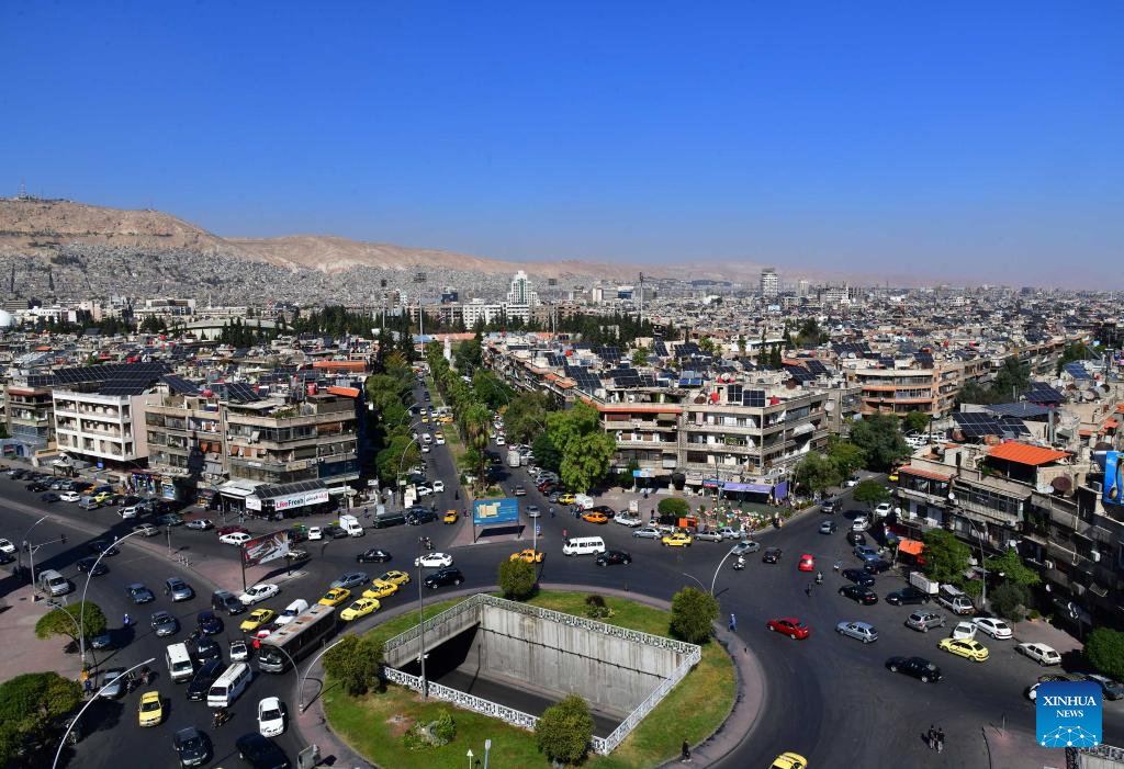 Solar panels seen on rooftops in Damascus, Syria