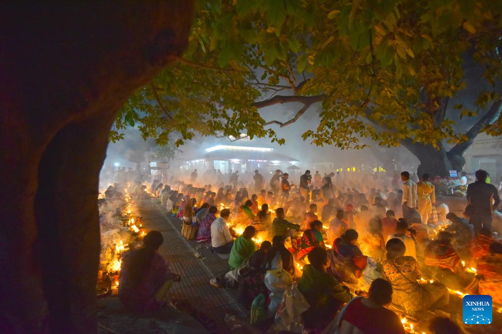 Bangladeshi devotees sit for prayer during religious fasting festival